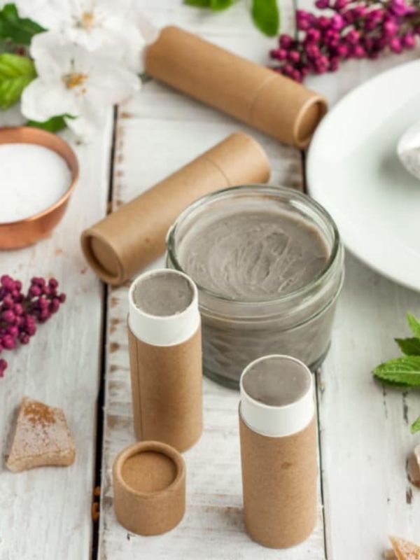 A jar and 2 brown lipstick tubes filled with homemade natural deodorant