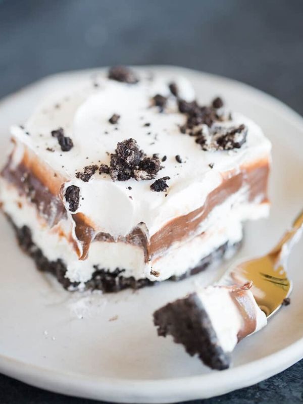 No-Bake Oreo Layer Dessert on a White Plate