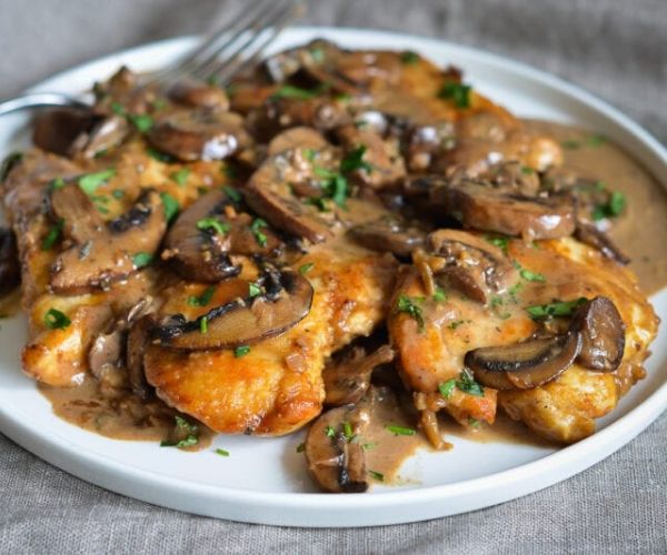 Chicken Marsala on a White Plate