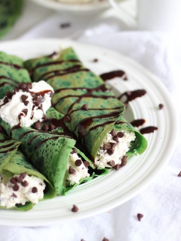 Green Velvet Crepes with Bailey’s Chocolate Chip Cheesecake Filling